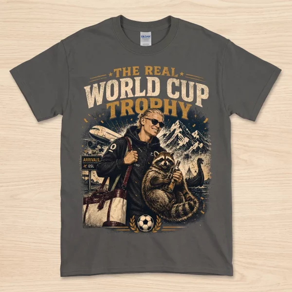 Collection of folded t-shirts in navy, gray, green, red, and black, displaying the vintage soccer print.