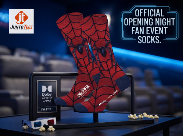 Spider-Man themed red web socks displayed in a cinema setting