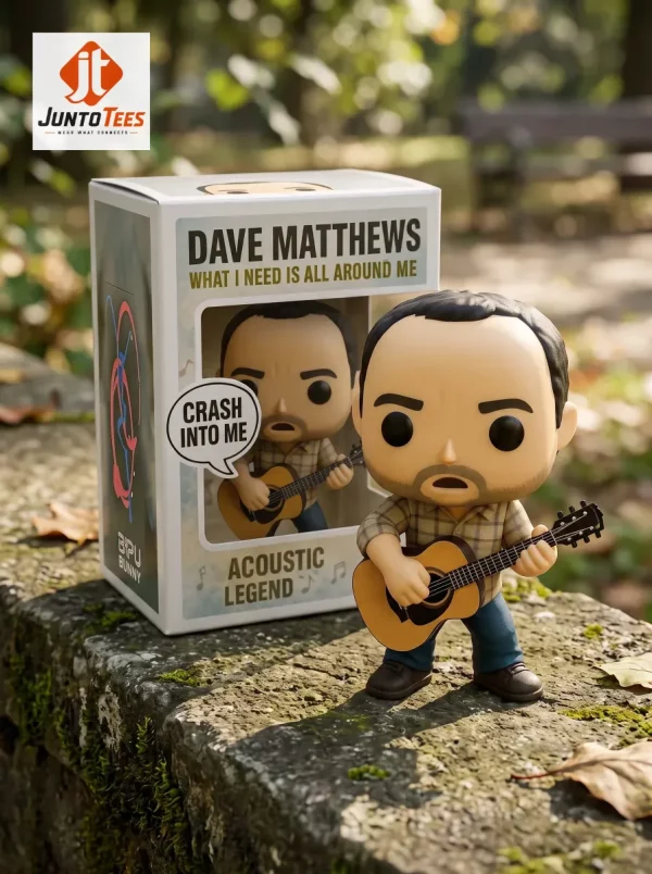 Dave Matthews themed collectible figurine next to its display box on a rustic stone ledge.