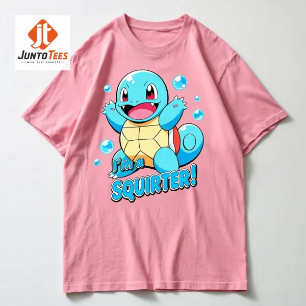 A soft pink unisex t-shirt featuring a vibrant blue turtle character graphic.
