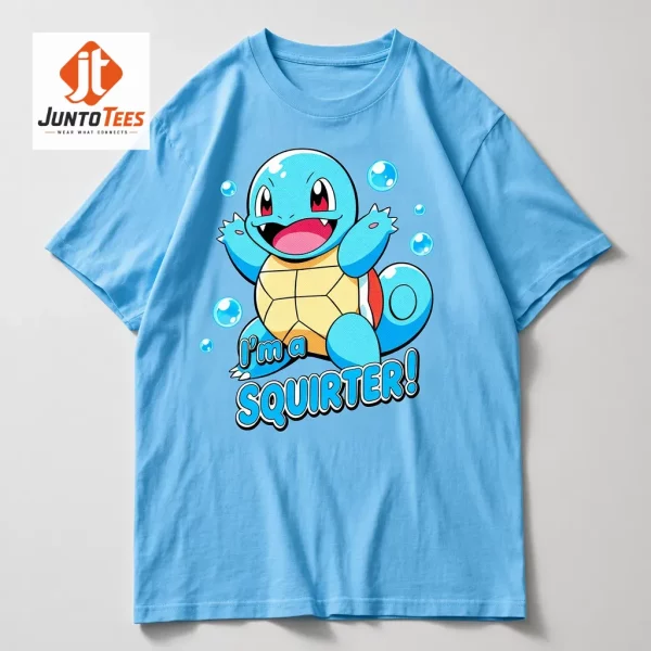 A soft pink unisex t-shirt featuring a vibrant blue turtle character graphic. (Detail view #3)