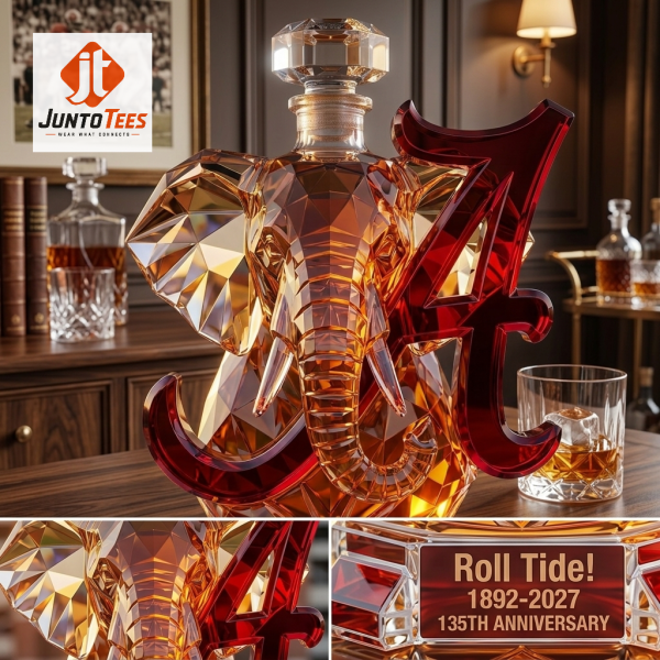 Geometric glass elephant decanter with crimson logo on a study desk. (Detail view #4)