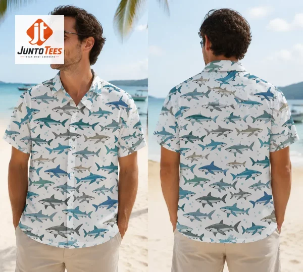 Front view of a white Hawaiian shirt with a repeating shark pattern.
