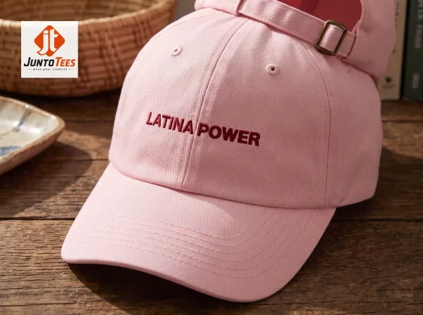 Pink Latina Power Embroidered Hat Smithsonian 1 A soft pink cotton baseball cap with Latina Power embroidery in dark red thread. (Detail view #2)
