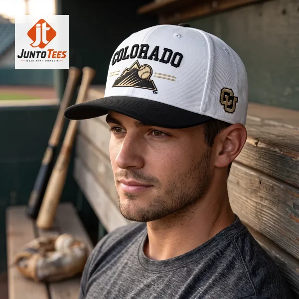 Colorado Rockies University of Colorado Hat August 21st 2026 Giveaway 1 Two caps displayed on a vintage trunk with baseballs and a compass nearby.