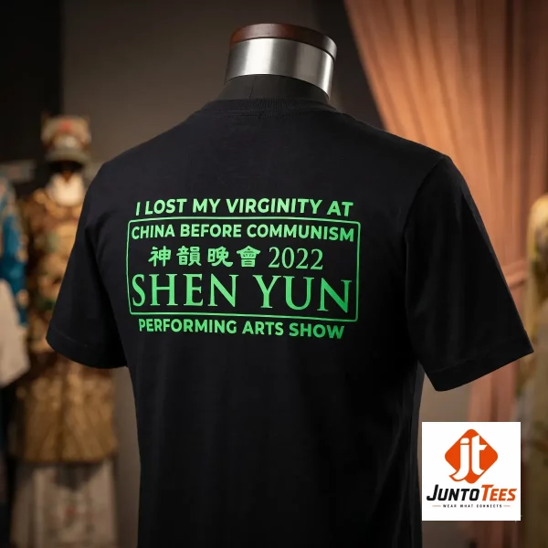 Rear view of a person wearing a black cotton t-shirt with a teal-printed meme graphic.