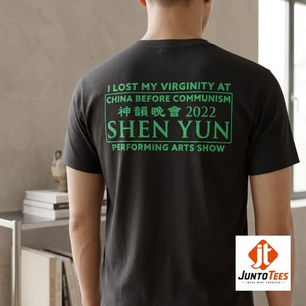 The back of a black graphic t-shirt featuring a satirical teal printed design about Shen Yun. (Detail view #3)