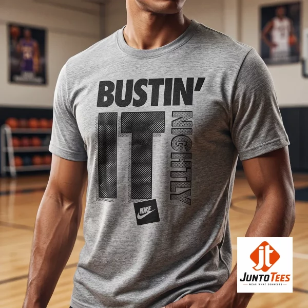 CJ McCollum Nike "Bustin' It Nightly" graphic t-shirt 4 A front view of a white crew neck t-shirt showing the stylized Bustin' It Nightly graphic. (Detail view #5)