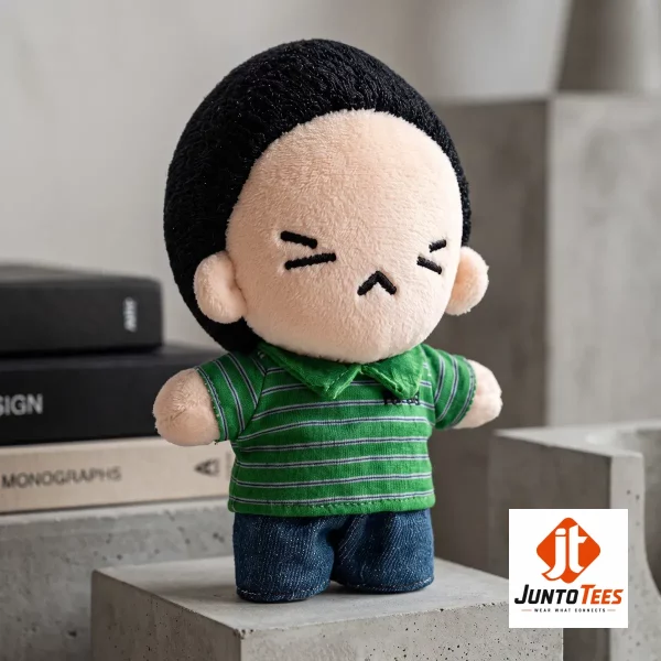 BTS Suga Yoongi Debut Plush Toys 2 Front view of a BTS Suga Yoongi plush toy wearing a green striped shirt and black beanie on a wooden base. (Detail view #3)