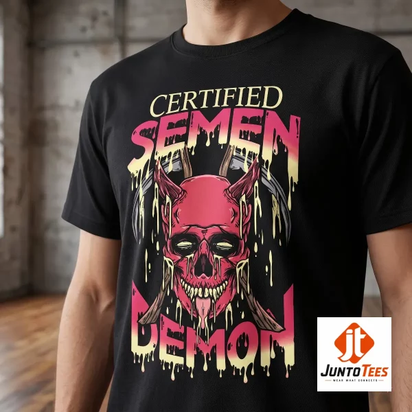 Matt Rife ProbleMATTic Certified Semen Demon Metal Skull Graphic T-Shirt 1 A black cotton crew neck shirt featuring a demonic skull graphic with scythes and melting text on a wooden surface. (Detail view #2)