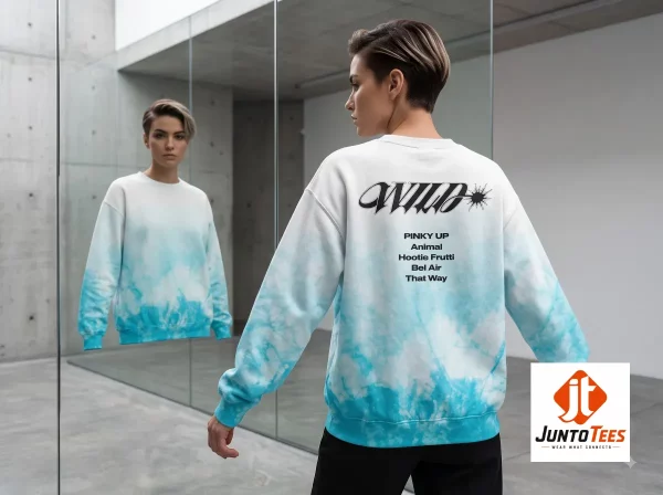 KATSEYE Wild Tracklist Pop-Up Merch 2026 AOP Sweatshirt 1 Front and back view of a white to sky blue gradient sweatshirt with KATSEYE Wild tracklist text graphic. (Detail view #2)