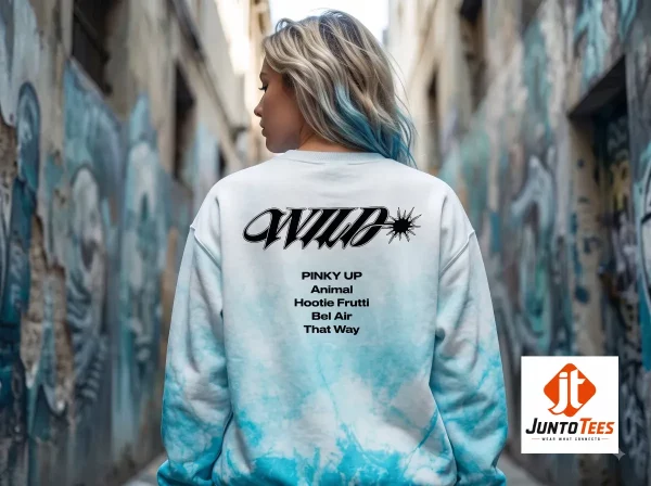 KATSEYE Wild Tracklist Pop-Up Merch 2026 AOP Sweatshirt 2 Front and back view of a white to sky blue gradient sweatshirt with KATSEYE Wild tracklist text graphic. (Detail view #3)