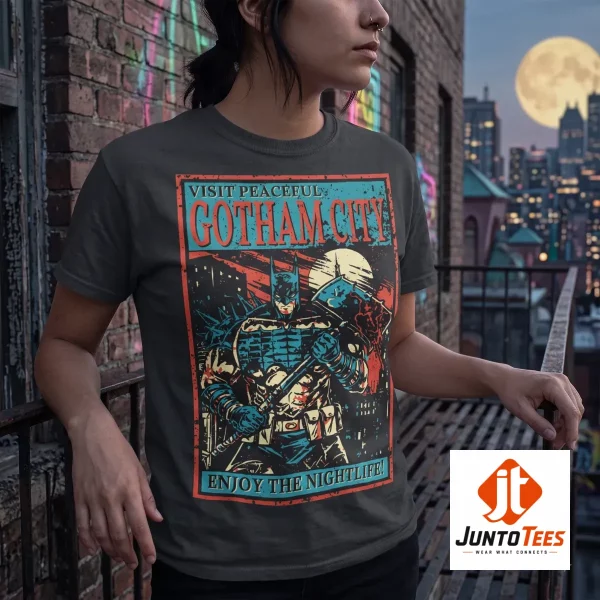 Front view of a black graphic t-shirt featuring a stylized Batman travel poster design with vintage colors. (Detail view #4)