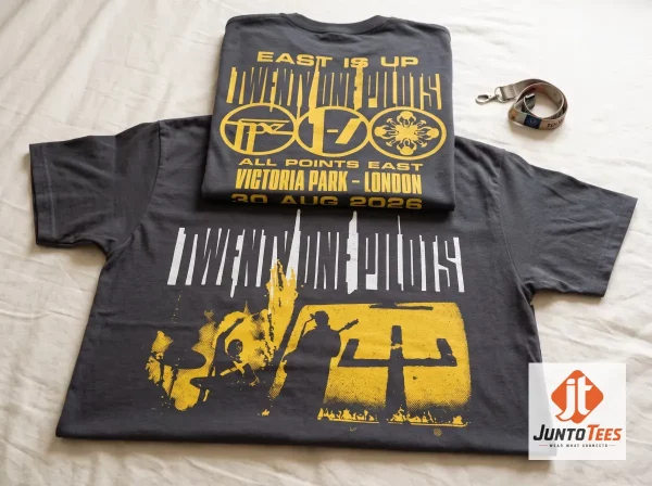 Twenty One Pilots All Points East 2026 festival merchandise t-shirt with yellow graphic on charcoal fabric.