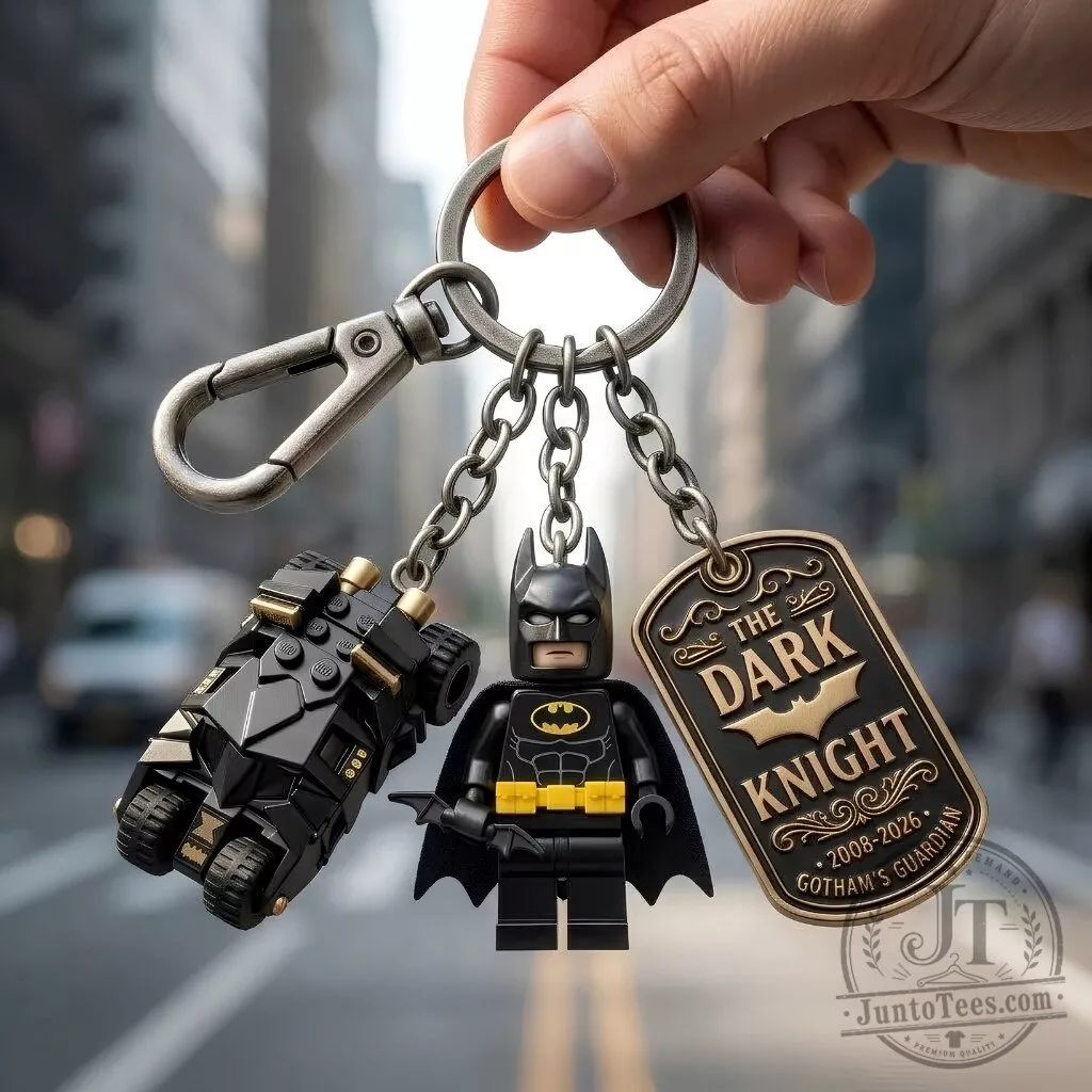 Batman Dark Knight Minifigure Keychain with Batmobile and Dog Tag Charms 2 Batman minifigure keychain with black cape and yellow bat symbol, Batmobile charm, and bronze dog tag reading The Dark Knight Gothams Guardian